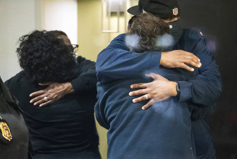 THE INDIANAPOLIS STAR VIA AP
                                People hug after learning that their loved one is safe after a shooting inside a FedEx building. Multiple people were shot and killed in a late-night shooting at a FedEx facility in Indianapolis, and the shooter killed himself, police said.