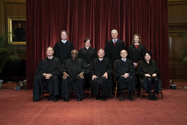 ASSOCIATED PRESS
                                Members of the Supreme Court posed for a group photo, April 23, at the Supreme Court in Washington. Seated from left were Associate Justice Samuel Alito, Associate Justice Clarence Thomas, Chief Justice John Roberts, Associate Justice Stephen Breyer and Associate Justice Sonia Sotomayor. Standing from left were Associate Justice Brett Kavanaugh, Associate Justice Elena Kagan, Associate Justice Neil Gorsuch and Associate Justice Amy Coney Barrett.