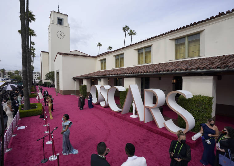 ASSOCIATED PRESS
                                Maria Bakalova, from left, Andra Day and Regina King are interviewed and Marlee Matlin walks the red carpet at the Oscars on Sunday, at Union Station in Los Angeles.