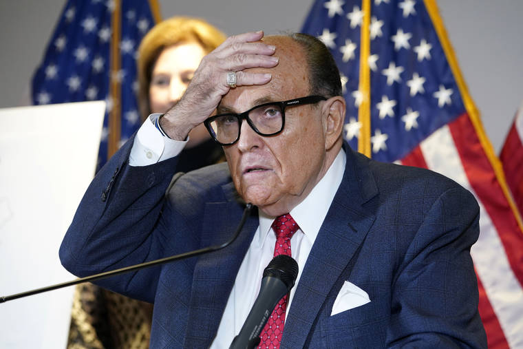 ASSOCIATED PRESS
                                Former New York Mayor Rudy Giuliani, who was a lawyer for President Donald Trump, spoke, Nov. 19, during a news conference at the Republican National Committee headquarters in Washington. Federal investigators in Manhattan executed a search warrant today at the Upper East Side apartment of Rudy Giuliani.