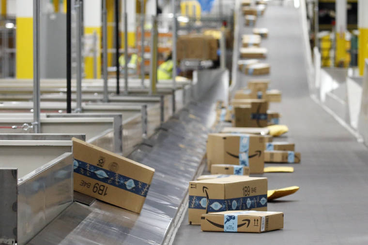 ASSOCIATED PRESS / 2019
                                Amazon packages move along a conveyor at an Amazon warehouse facility in Goodyear, Ariz.