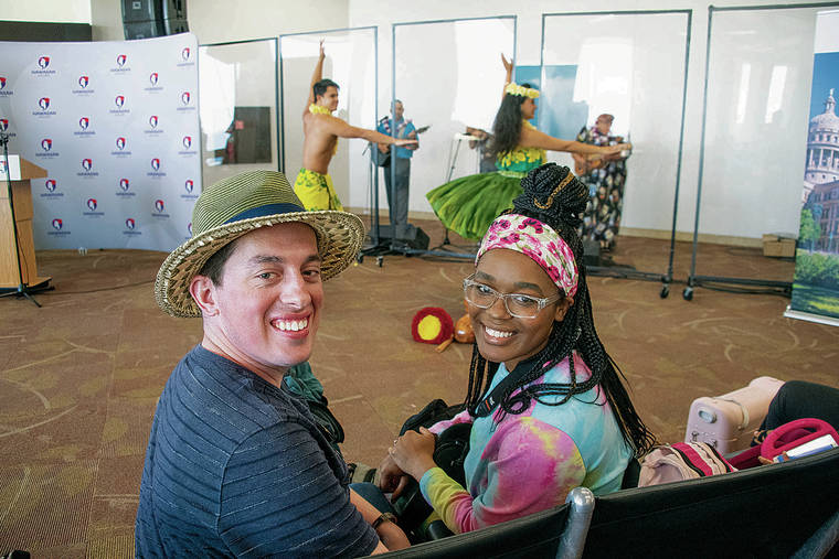 CRAIG T. KOJIMA / CKOJIMA@STARADVERTISER.COM
                                Hawaiian Airlines celebrated its inaugural service between Honolulu and Austin Wednesday with a gate ceremony at Daniel K. Inouye International Airport. Travelers Amani and Erich Albertsen enjoyed the performance by dancers Jon Lum Lung and Jorin Young and the music of Kawika Trask and the Serenaders.