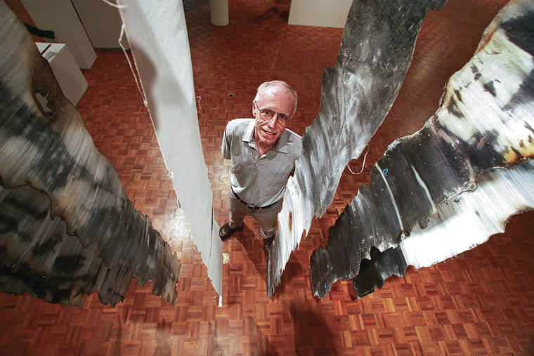 STAR-ADVERTISER / 2006
                                Tom Klobe stands among art pieces by Seng Phengsavath at the UH Art Gallery in 2006, where Klobe was the director.