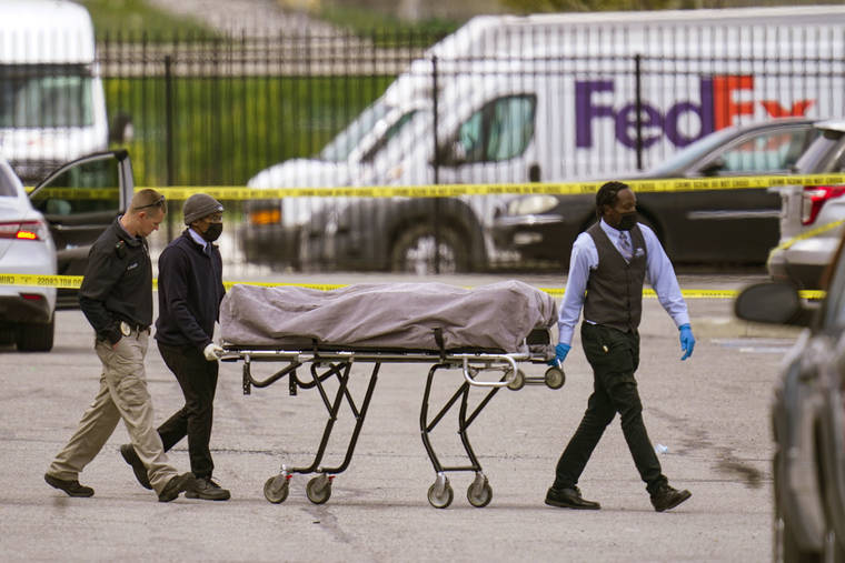 ASSOCIATED PRESS
                                A body is taken from the scene where multiple people were shot at a FedEx Ground facility in Indianapolis. A gunman killed several people and wounded others before taking his own life in a late-night attack at a FedEx facility near the Indianapolis airport, police said.