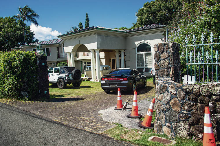 CRAIG T. KOJIMA / CKOJIMA@STARADVERTISER.COM
                                Lindani Sanele Myeni was suspected of entering this home on Coelho Way in Nuuanu on Wednesday night. After attacking police officers, he was Tasered, then fatally shot.