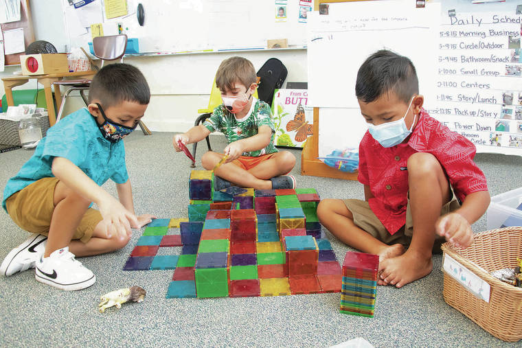 CRAIG T. KOJIMA / CKOJIMA@STARADVERTISER.COM
                                Keolu Elementary School Principal Gay Kong said having a prekindergarten class at her school has made a huge difference in students’ readiness. Above, children worked Friday on creating a maze for class.