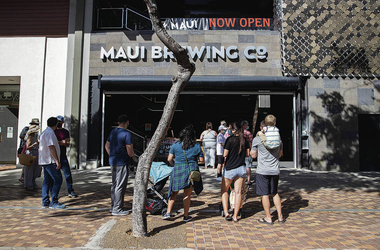 CINDY ELLEN RUSSELL / CRUSSELL@STARADVERTISER.COM
                                Customers wait in line at Maui Brewing Co. in Waikiki.
