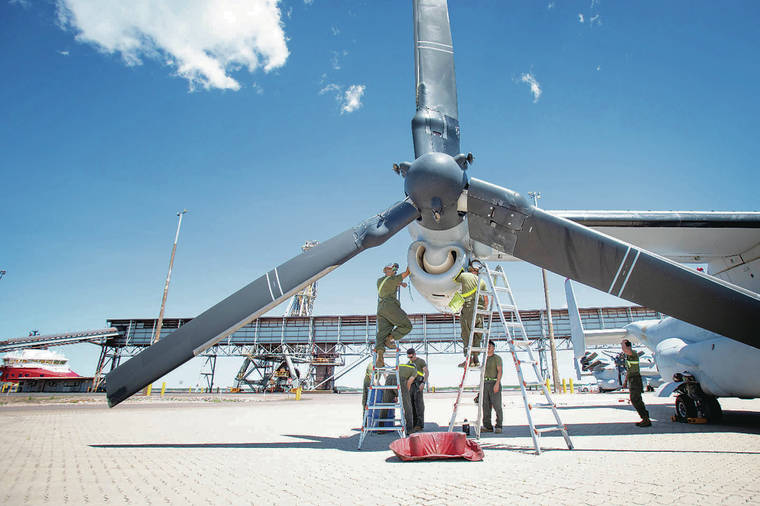 U.S. MARINE CORPS / APRIL 14
                                Hawaii is sending more Marines to Australia this year as part of an annual rotational deployment called the Marine Rotational Force-Darwin 2021. Hawaii Marines with the MRF-D perform maintenance on a MV-22B Osprey at the East Arm Wharf in Darwin, Australia.