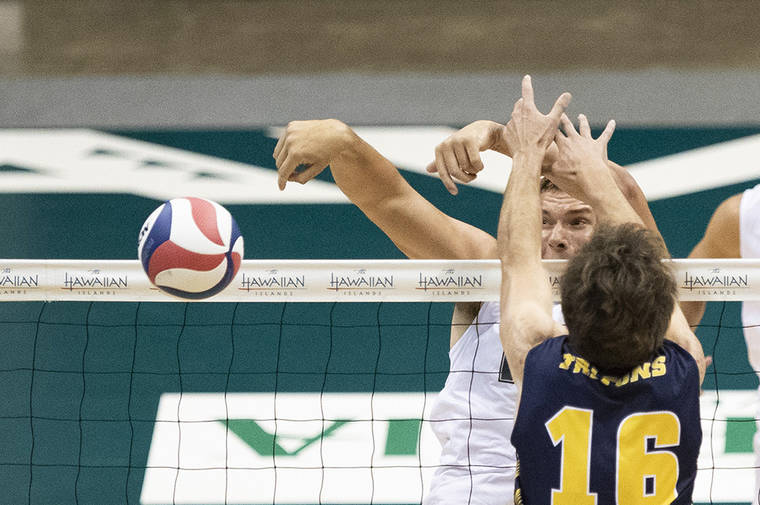 CINDY ELLEN RUSSELL / CRUSSELL@STARADVERTISER.COM
                                Hawaii middle blocker Patrick Gasman slammed a kill past San Diego middle blocker Shane Benetz during the first set of a semifinal match in the Big West men’s volleyball tournament on Friday at SimpliFi Arena at Stan Sheriff Center. UC San Diego upset Hawaii in five sets but the Rainbows still received the top seed in the upcoming NCAA tournament.