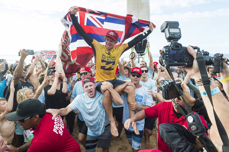 COURTESY WSL
                                John John Florence of Hawaii is carried up the beach after winning his semifinal of the 2017 Billabong Pipe Masters in celebration of becoming a two-time World Champion. Florence dreamed of winning a World Title in Hawaii and that dream became a reality when he backed up his 2016 World Title which he won in Portugal with the 2017 World Title in Hawaii.