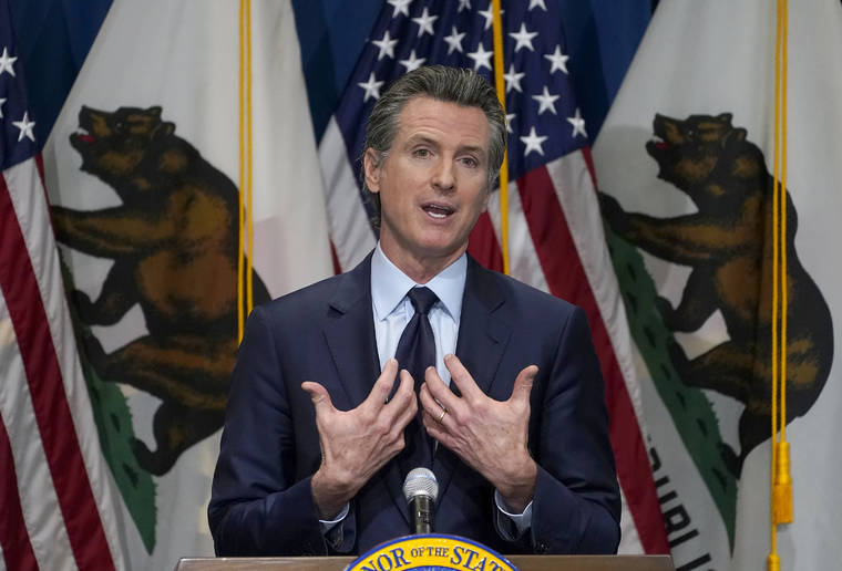 AP PHOTO/RICH PEDRONCELLI, POOL / JAN. 8
                                California Gov. Gavin Newsom outlines his 2021-2022 state budget proposal during a news conference in Sacramento, Calif. The California Democratic Party is gathering for its annual convention on the heels of a recall against Newsom reaching the signature threshold to qualify for the ballot.