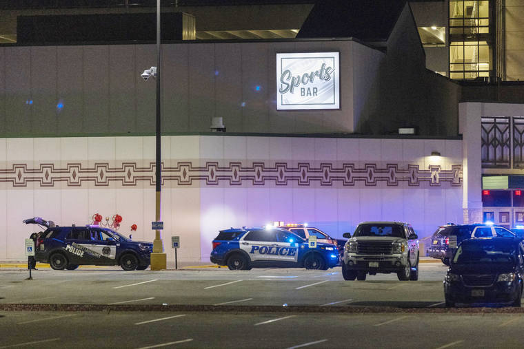 ASSOCIATED PRESS
                                Police line the parking lot outside the Oneida Casino near Green Bay, Wisconsin.
