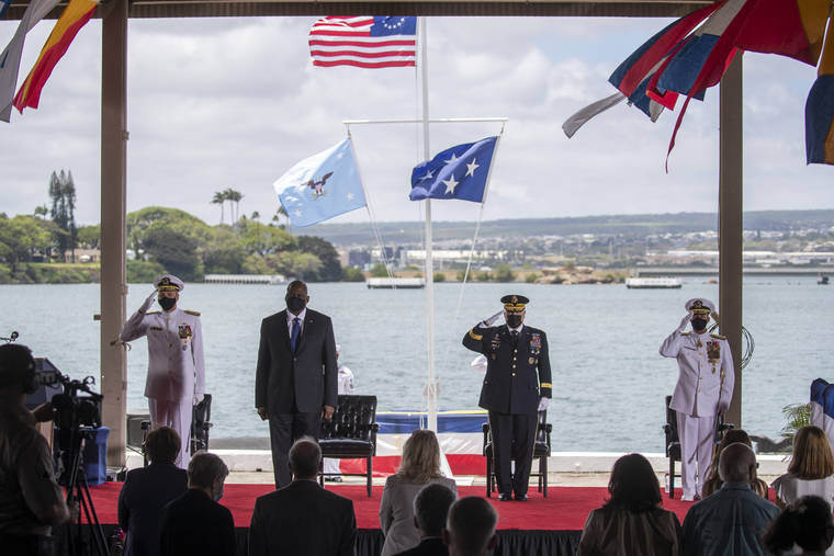 CINDY ELLEN RUSSSELL / CRUSSELL@STARADVERTISER.COM
                                Adm. Philip S. Davidson, left to right, U.S. Secretary of Defense Lloyd J. Austin, Chairman of the Joint Chiefs of Staff Gen. Mark A. Milley and Adm. John C. Aquilino attend a Change of Command ceremony for the U.S Indo-Pacific Command, Friday, at Joint Base Pearl Harbor-Hickam. In his first major speech as Pentagon chief, Lloyd Austin on Friday called for developing a “new vision” for American defense in the face of emerging cyber and space threats and the prospect of fighting bigger wars.