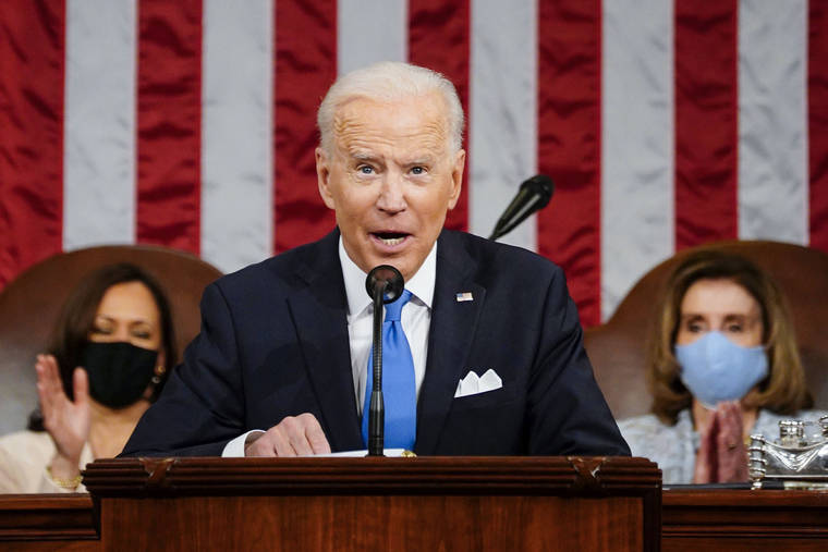ASSOCIATED PRESS
                                President Joe Biden addresses a joint session of Congress, Wednesday, in the House Chamber at the U.S. Capitol in Washington, as Vice President Kamala Harris, left, and House Speaker Nancy Pelosi of Calif., applaud.