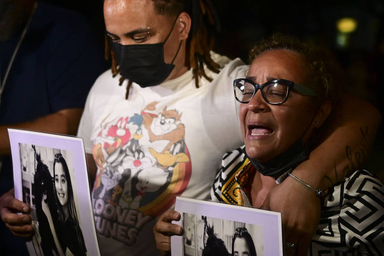 ASSOCIATED PRESS
                                Keila Ortiz, the mother of Keishla Rodriguez, cried out for justice after boxer Felix Verdejo was arrested in connection with the death of her 27-year-old pregnant daughter whose body was found in a lagoon, outside FBI headquarters in San Juan, Puerto Rico, Sunday.