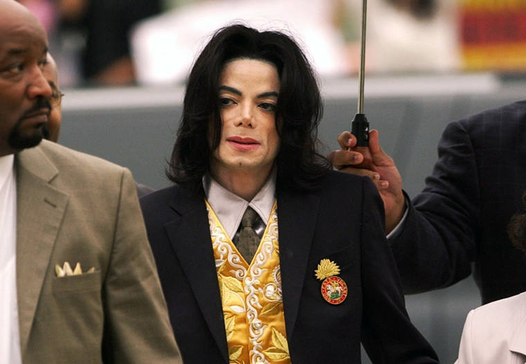 ASSOCIATED PRESS / 2005
                                Michael Jackson arrives at the Santa Barbara County Courthouse for his trial in Santa Maria, Calif.