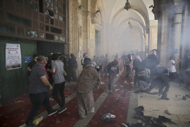 ASSOCIATED PRESS
                                Palestinians clashed with Israeli security forces at the Al Aqsa Mosque compound in Jerusalem’s Old City, today. Palestinian medics said at least 180 Palestinians were hurt in the violence at the Al-Aqsa Mosque compound, including 80 who were hospitalized.