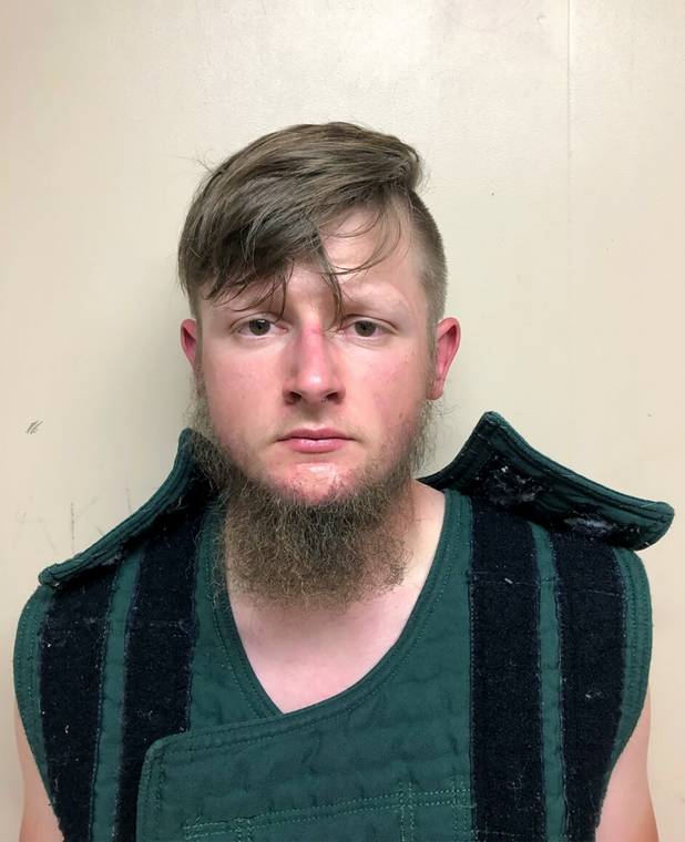 CRISP COUNTY SHERIFF’S OFFICE VIA ASSOCIATED PRESS
                                A March 16 booking photo provided by the Crisp County, Ga., Sheriff’s Office shows Robert Aaron Long, 22, accused of killing eight people, six of them women of Asian descent, in shootings at three Atlanta-area massage businesses.