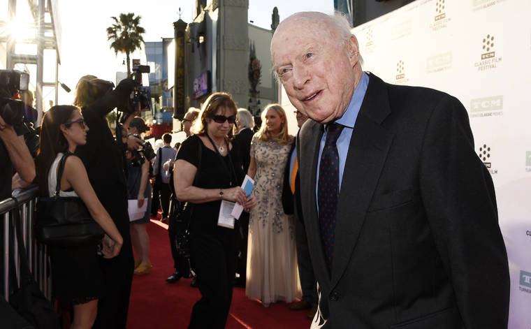 CHRIS PIZZELLO/INVISION VIA AP / 2015
                                Norman Lloyd poses before a 50th anniversary screening of the film “The Sound of Music” at the opening night gala of the TCM Classic Film Festival in Los Angeles.