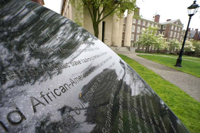 ASSOCIATED PRESS
                                Words engraved on a stone plinth formed a component of the Slavery Memorial by sculptor Martin Puryear, erected in 2014, on the Brown University campus in Providence, R.I., May 4. An “Anti-Black Racism” task force is expected to deliver recommendations soon for how the school can further promote racial equity. But university spokesperson Brian Clark stressed it’s not clear whether the panel, which was formed during last summer’s racial unrest, will address reparations.