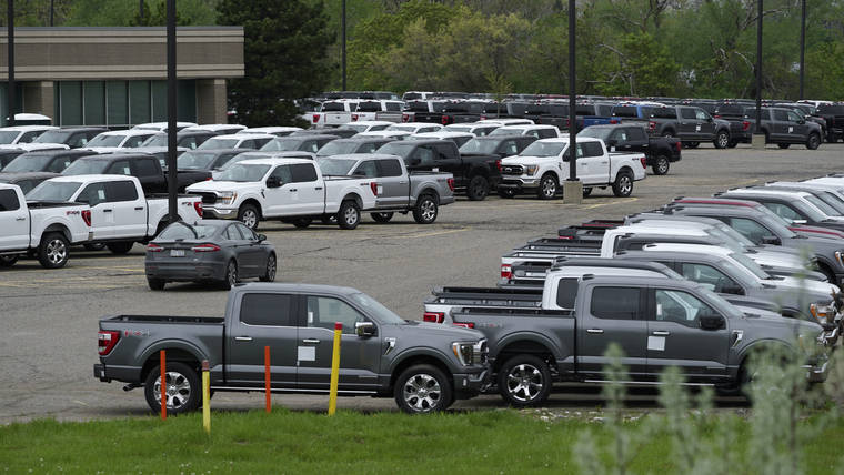 ASSOCIATED PRESS
                                Ford pickup trucks built lacking computer chips were shown in parking lot storage in Dearborn, Mich., May 4. Automakers are cutting production as they grapple with a global shortage of computer chips, and that’s making dealers nervous.