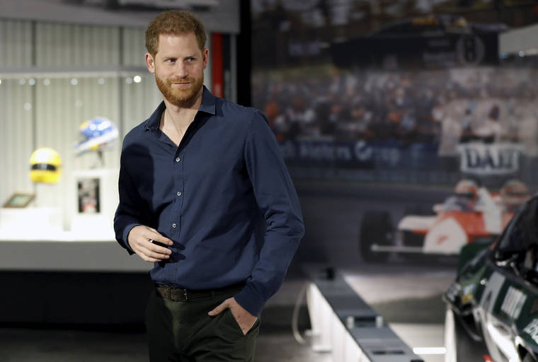 ASSOCIATED PRESS
                                Britain’s Prince Harry visits the Silverstone Circuit, in Towcester, England, in 2020. In an episode of the “Armchair Expert” podcast broadcast today, Prince Harry compared his royal experience to being on “The Truman Show” and “living in a zoo.”