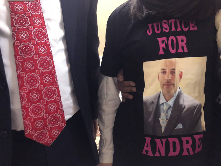 ASSOCIATED PRESS
                                Andre Hill, fatally shot by Columbus police on Dec. 22, is memorialized on a shirt worn by his daughter, Karissa Hill, on Dec. 31, in Columbus, Ohio. Ohio’s capital city will pay a $10 million settlement for the family of Hill, a Black man who was fatally shot by a white Columbus police officer in December as he emerged from a garage holding a cellphone, the Columbus city attorney announced today.