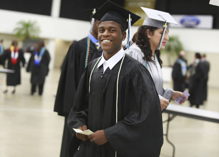 ASSOCIATED PRESS / MAY 23, 2016
                                Royal Palm Beach High School student Damon Weaver during his high school graduation in West Palm Beach, Fla. Weaver gained national acclaim when he interviewed President Barack Obama at the White House in 2009. Weaver, 23, died of natural causes on May 1, his family says.