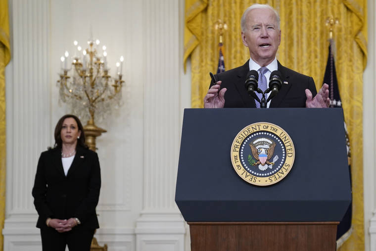 ASSOCIATED PRESS
                                Vice President Kamala Harris listened as President Joe Biden spoke about distribution of COVID-19 vaccines, in the East Room of the White House, today, in Washington.