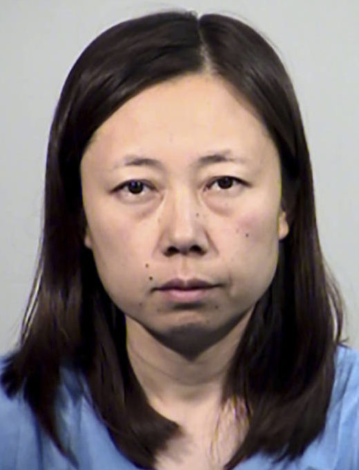 TEMPE POLICE DEPARTMENT VIA ASSOCIATED PRESS A booking photo released, Saturday, by Tempe Police Department shows Yui Inoue, 40, who is jailed for allegedly killing her two children in Temple, Ariz