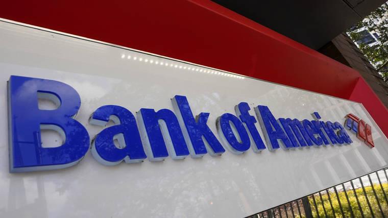 ASSOCIATED PRESS Bank of America signage was shown, Feb. 10, in Atlanta. Consumer banking giant Bank of America plans to set the minimum wage for all positions at the company to $25 an hour by 2025, the bank said today.
