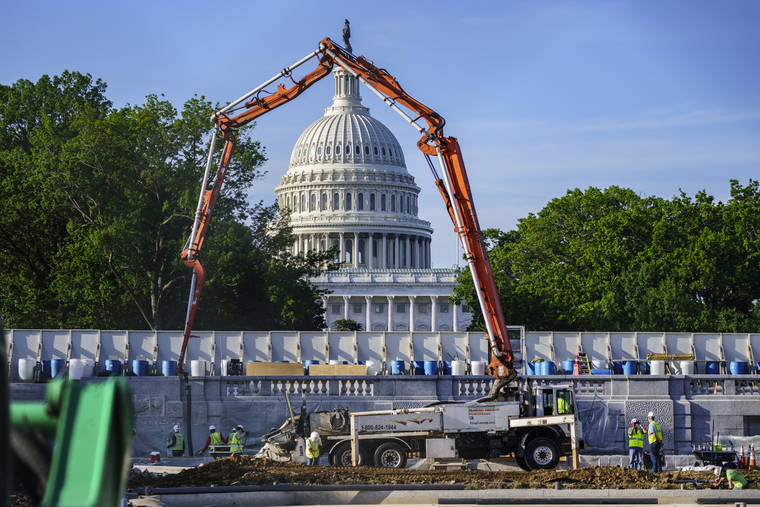 ASSOCIATED PRESS
                                A concrete pump framed the Capitol Dome during renovations and repairs to Lower Senate Park on Capitol Hill in Washington, Tuesday. Prospects for an ambitious infrastructure deal were thrown into serious doubt late today after the White House reduced President Joe Biden’s sweeping proposal to $1.7 trillion but Republican senators rejected the compromise as disappointing, saying “vast differences” remain.