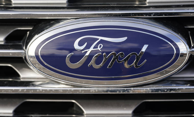 ASSOCIATED PRESS / APRIL 25
                                The blue oval logo of Ford Motor Company is shown in east Denver.
