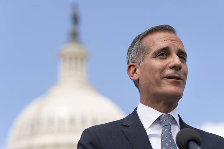 ASSOCIATED PRESS
                                Los Angeles Mayor Eric Garcetti speaks during a news conference with House Transportation and Infrastructure Committee Chair Peter DeFazio, left, on May 12 on Capitol Hill in Washington.