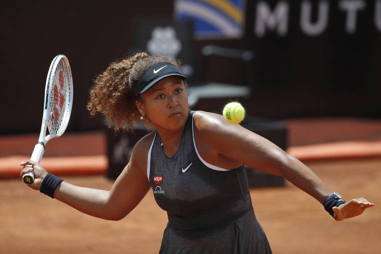 ASSOCIATED PRESS
                                Naomi Osaka of Japan returned the ball to Jessica Pegula of the United States during their match at the Italian Open tennis tournament, in Rome, May 12. Osaka lost against Pegula 7-6, 6-2.
