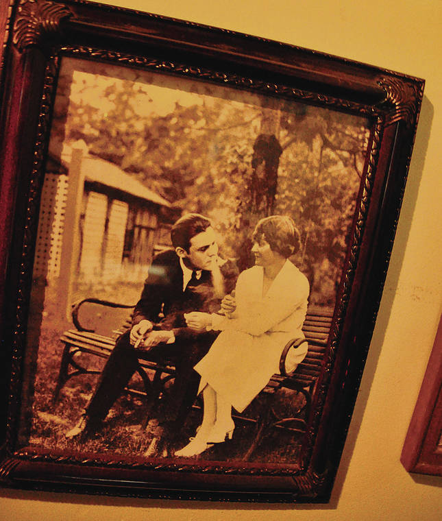 TRIBUNE NEWS SERVICE
                                A photo of Ernest Hemingway and his first wife, Elizabeth Hadley Richardson, hangs in the Horton Bay General Store in Boyne City, Mich.