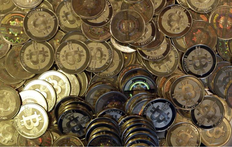 ASSOCIATED PRESS
                                Bitcoin tokens, seen in April 2013, in Sandy, Utah. The crypto bubble that inflated Bitcoin’s value past $1 trillion and added billions to nonsense digital tokens overnight is bursting.