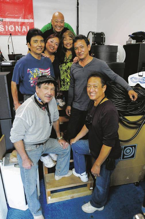 STAR-ADVERTISER / 2011
                                Dennis Mendoza, front right, keyboard player and leader of one of Hawaii’s top bands in the 1970s and ’80s, died Wednesday at the age of 70. He is pictured above with his Aura bandmates — clockwise from left, Bill Popaka, Brian Mendoza, Beverly Mendoza Orbello, Adney Atabay, Christine Mendoza Olanda and Del Mendoza — in rehearsals for a ’70s Nightclub Reunion show.