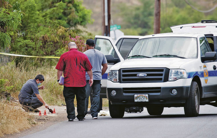 CINDY ELLEN RUSSELL / CRUSSELL@STARADVERTISER.COM
                                HPD investigated a 911 call Monday of multiple gunshots along Paakea Road where a man, later identified as Jonah Ongory, was found shot to death.
