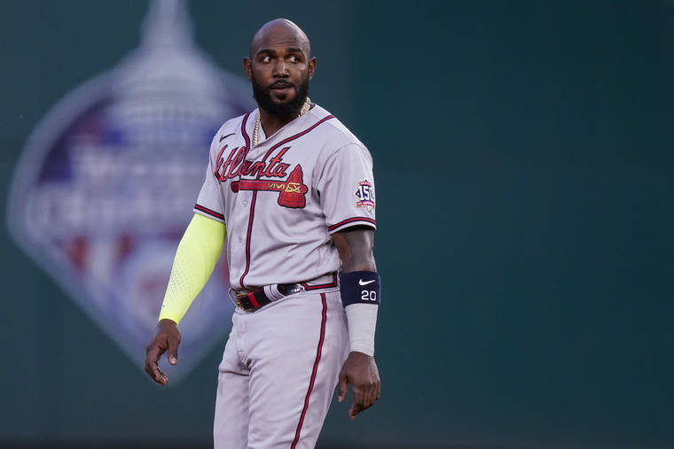 ASSOCIATED PRESS
                                Atlanta Braves’ Marcell Ozuna stands on the field during the inning of baseball game against the Washington Nationals at Nationals Park on May 4 in Washington.