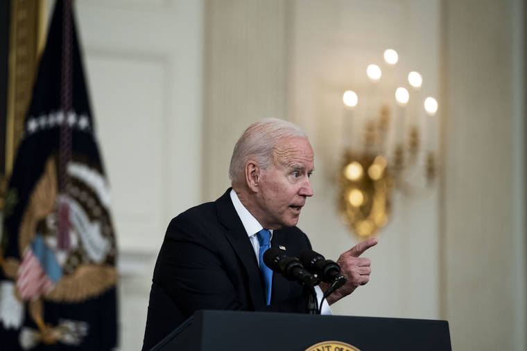 NEW YORK TIMES
                                President Joe Biden responds to reporters questions after speaking about his American Rescue Plan, at the White House in Washington, Wednesday.