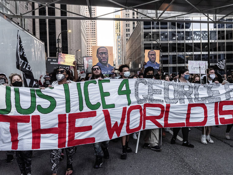NEW YORK TIMES / MARCH 29
                                Hundreds of protesters march during a rally sparked by the death of George Floyd on the first day of police officer Derek Chauvin’s trial, in Minneapolis.