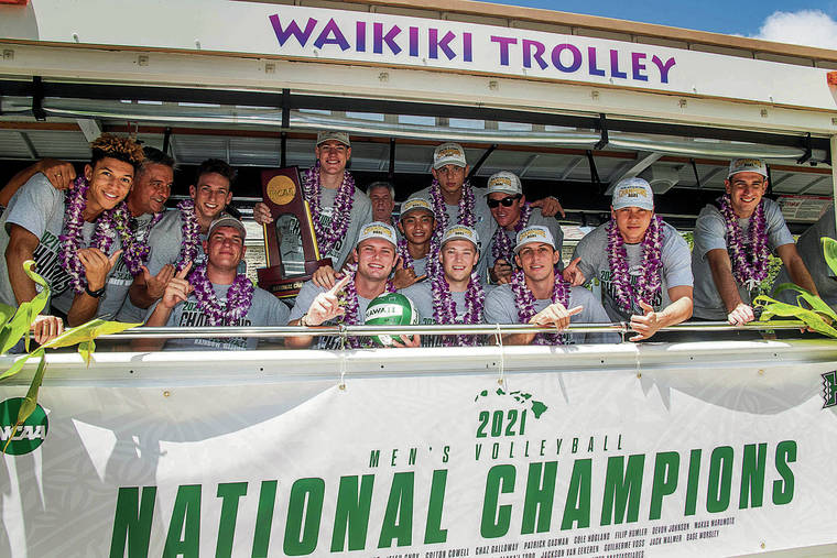 CRAIG T. KOJIMA/CKOJIMA@STARADVERTISER.COM
                                The UH volleyball team took a trolley ride around downtown and posed for a shot before ceremonies at City Hall.
