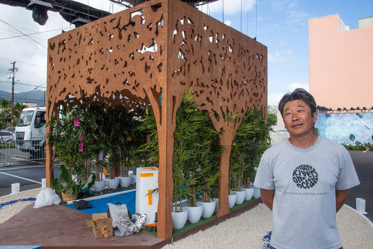 CRAIG T. KOJIMA / CKOJIMA@STARADVERTISER.COM
                                Lighting designer Hideaki Tsutsui stands in front of his installation. The public is invited to book 30-minute visits to the interactive art installation as a way to feel connected with loved ones — past and present — from 5 to 9 p.m. Friday to June 5.