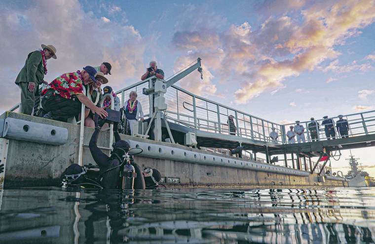 COURTESY NATIONAL PARK SERVICE / 2019
                                USS Arizona survivor Lauren Bruner was interred by divers in the submerged wreck of the USS Arizona at Pearl Harbor in 2019.