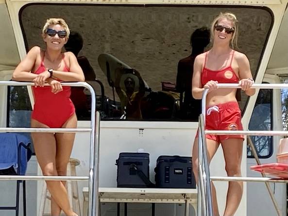 Kaiulani Bowers, left, and Maddie Anzivino,right, made history Sunday when they became the first two female lifeguards at Honolulu Ocean Safety to guard a North Shore beach together.