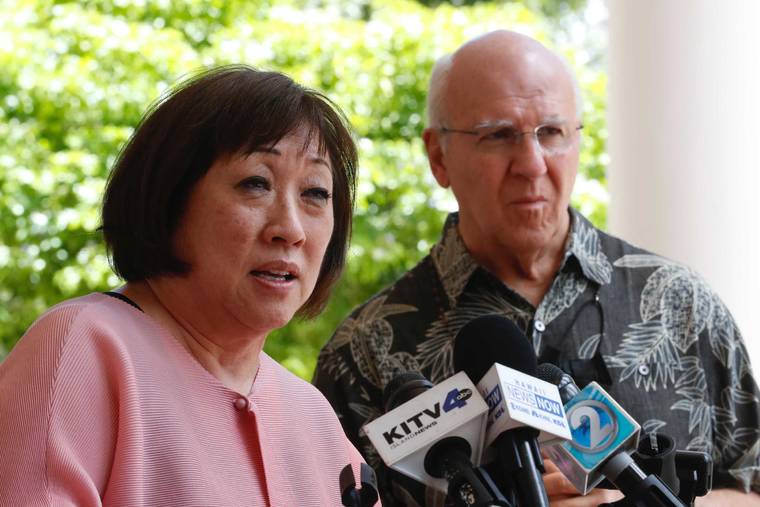 GEORGE F. LEE / GLEE@STARADVERTISER.COM
                                Colleen Hanabusa and Rick Blangiardi together at a press conference today.