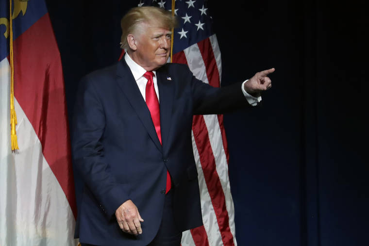 ASSOCIATED PRESS
                                Former President Donald Trump acknowledged the crowd as he spoke at the North Carolina Republican Convention, Saturday, in Greenville, N.C.