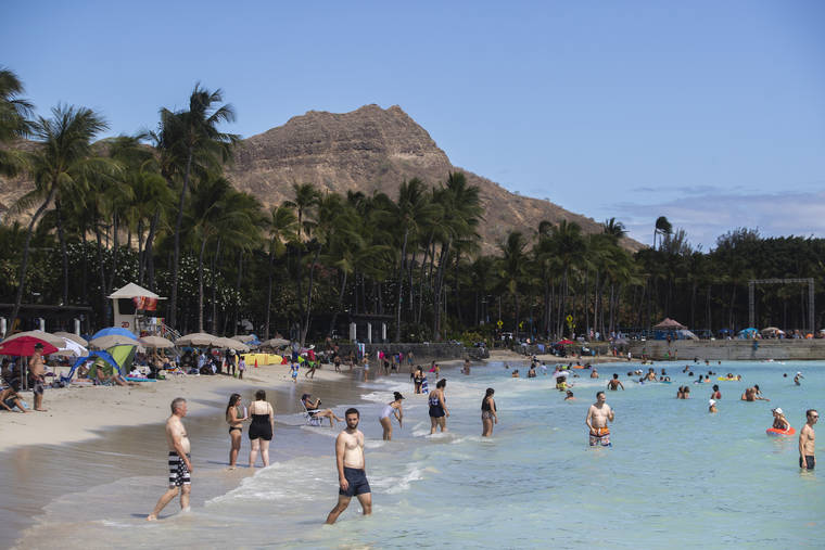 CINDY ELLEN RUSSELL / JULY 8
                                Waikiki was busy Thursday, which marked the first day for mainland U.S. travelers who are fully vaccinated to skip quarantine and pre-travel COVID-19 testing as long as they could provide proof of vaccination status via Hawaii’s Safe Travels program.