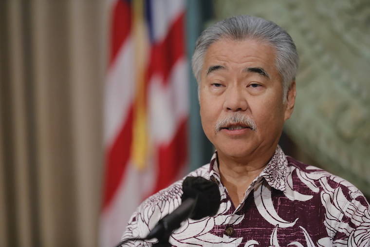 JAMM AQUINO / JUNE 21
                                Gov. David Ige speaks during a news conference at the State Capitol in June.
